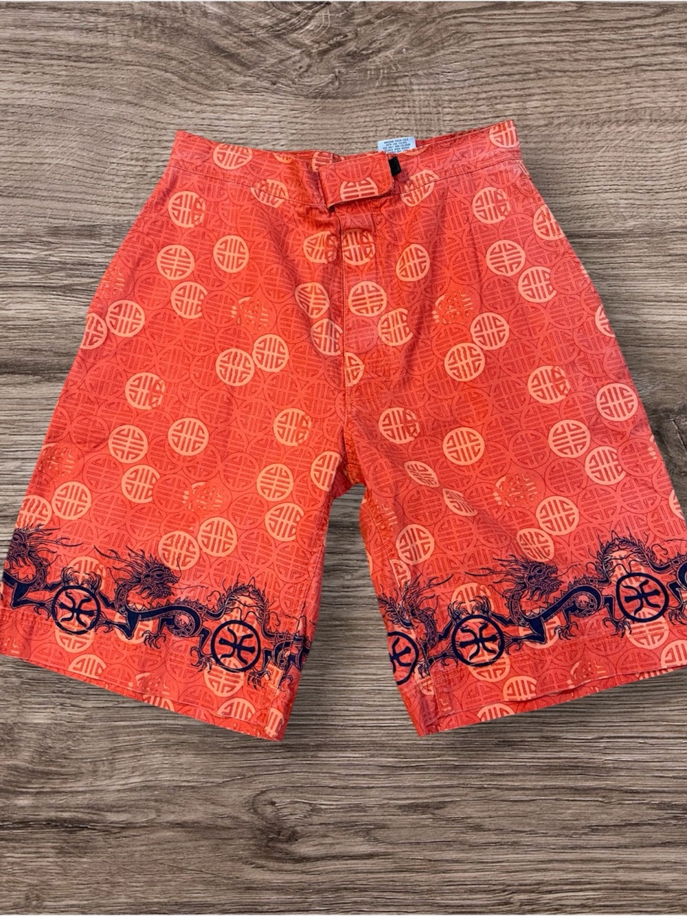 Arizona Jean Company Orange Swim Board Shorts with Navy Dragon Border